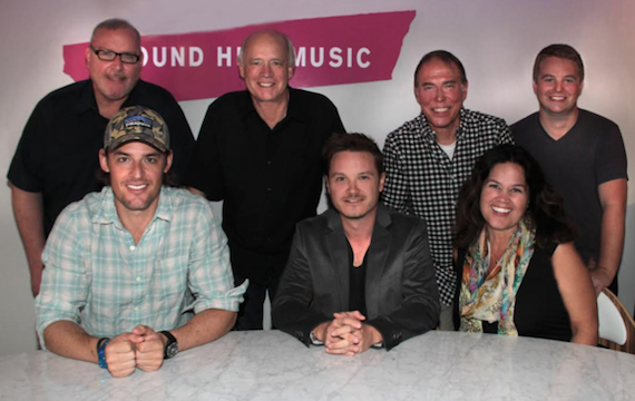 Pictured (L-R, Front Row): Josh Gruss - RHM CEO, Josh Kear, Carla Wallace - Co-owner, Big Yellow Dog. Pictured (L-R, Back Row): Neil Gillis - RHM President, Kerry ONeil - Co-owner, Big Yellow Dog, Mark Brown - RHM VP/ GM Nashville, Josh Saxe - RHM Associate Director, Creative.