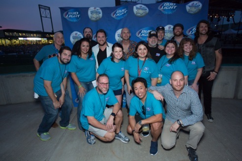 Pictured Back Row L - R: Bob Zlotnik - owner of Constellation Field, Jake Stewart  DJ,  Mike Eli, Jon Jones, Pat Middleton  DJ,  Al Farb - Morning Zoo Producer, James Young and Chris Thompson Middle row- Chris Fair, Promotions Coordinator.  Christi Brooks, MD.  Lisa Searcy, Marketing Director.  Linda V, DJ.  Candy Mendez, Promotions Manager and Marlane Disher  Promotions.  Front row- Kevin Kline - DJ, Johnny Chiang - PD/OM and George Couri  - Triple 8 Management.