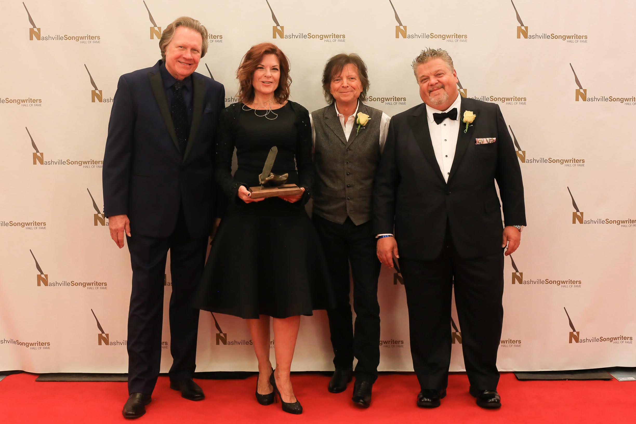 Pictured (L-R): x, Rosanne Cash, x, Craig Wiseman.