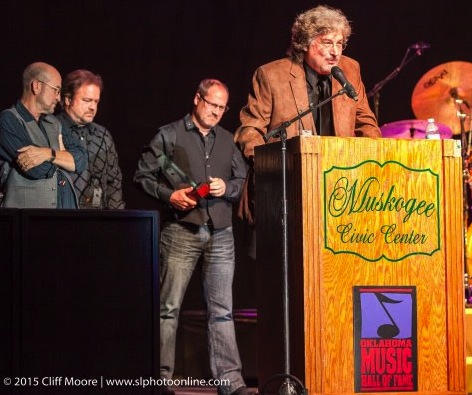 Restless Heart's Greg Jennings speaks on behalf of the band as Paul Gregg, Larry Stewart and Dave Innis look on