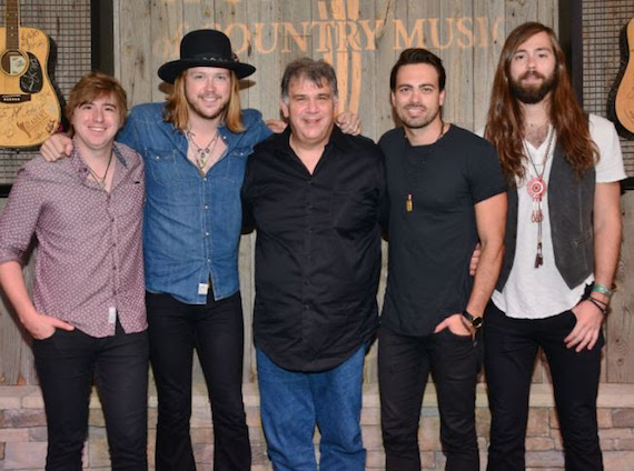 A Thousand Horses with Academy CEO, Bob Romeo. Photo: Michel Bourquard/Courtesy of the Academy of Country Music 