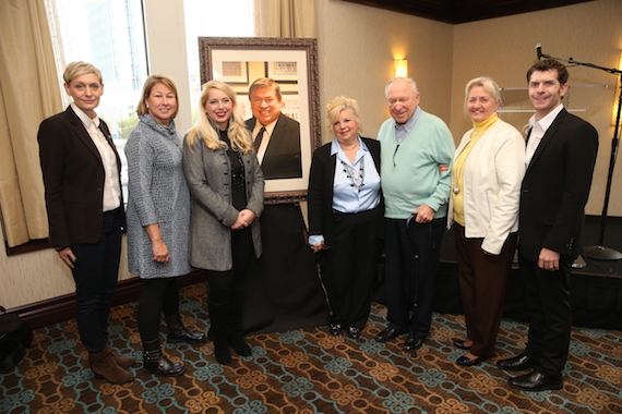 CMA Board member Milly Olykan and Chief Executive Officer Sarah Trahern gather with late Board member Jeff Walker's family after the CMA International Reception Wednesday in Nashville ahead of "The 49th Annual CMA Awards." (l-r) Olykan; Trahern; Christy Walker Watkins, Walker's daughter and Vice President of Publicity at AristoMedia Group; Walker's widow Terri; Walker's father, Bill; Walker's stepmother, Jeanine; and Walker's son-in-law Matt Watkins, Vice President of Marketing and Operations at AristoMedia Group. Photo Credit: John Russell / CMA