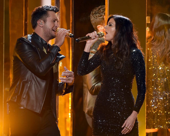 Luke Bryan and Karen Fairchild perform during the American Music Awards.