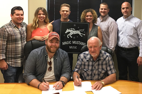 Pictured (front row L-R): Colton McGee, BBR Music Group; Magic Mustang Musics Lydia Schultz, Keithan Melton, Juli Newton-Griffith; Matt Cottingham, Ritholz Levy; Robert Filhart, ASCAP. (Bottom row L-R): Taylor Davis; Benny Brown, BBR Music Group President/CEO. Photo: BBR Music Group