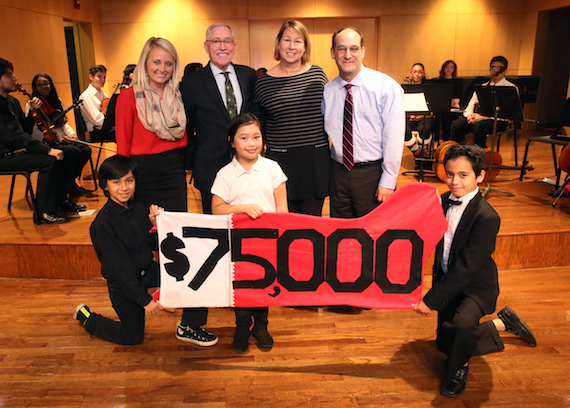 Pictured (front, L-R): W.O. Smith students Jean Carlo Arias Neda, age 10; Whitney Thai, age 8; and Gabriel Barreda, age 11. (Back, L-R): Tiffany Kerns, CMA Community Outreach Manager; Ron Samuels, CMA Foundation Board Chairman; Sarah Trahern, CMA Chief Executive Officer; Jonah Rabinowitz, W.O. Smith School Executive Director. Photo: Kayla Schoen / CMA