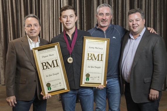 Pictured (L-R): Jody Williams (BMI Vice President, Writer and Publisher Relations), Scotty McCreery, Brian Wright (UMG Nashville Senior Vice President A&R), and Bradley Collins (BMI Executive Director, Writer-Relations). Photo: John Russell