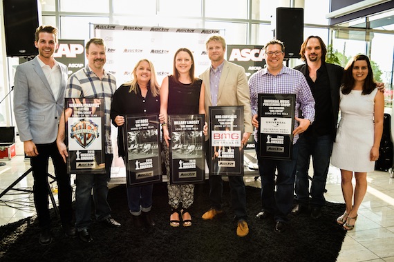 Girl Crush wins Song of the Year. Pictured (L-R): MusicRows Eric T. Parker, Warner/Chappells Ben Vaughn, Girl Crush songwriters Liz Rose and Hillary Lindsey, BMGs Kos Weaver, Universal Music Publishing Groups Kent Earls, and MusicRows Sherod Robertson and Sarah Skates. Not pictured: co-writer Lori McKenna. Photo: Bev Moser.