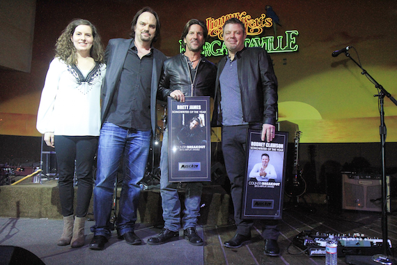 Pictured (L-R): MRs Sarah Skates and Sherod Robertson present Songwriter of the Year honors to Brett James and Rodney Clawson. Photo: Bev Moser/Moments By Moser