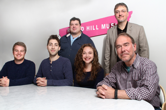 Pictured (L-R, Seated): Josh Saxe, Assoc. Dir. A&R, Round Hill; Marc Schmarx" Schneider; Savannah Savvy Giersch; Mark Brown, VP / GM Round Hill, Nashville. (Standing): Eric Griffin, attorney; Matthew Beckett, attorney