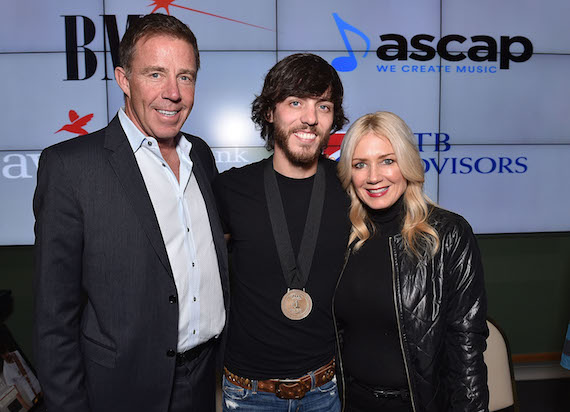 Pictured (L-R): TK Kimbrell (TKO Management), Chris Janson, and Kelly Janson. Photo: John Shearer/Getty Images for BMI.