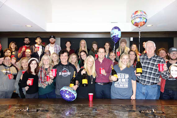 Pictured: Big Machine Label Group President/CEO Scott Borchetta (center left) leads celebrations with The Valory Music Co.s SVP Promotion George Briner (far right), VMC promo staff and fellow BMLG staffers.