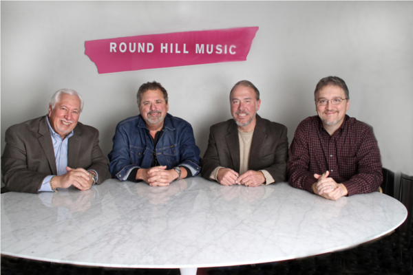 Pictured (L-R): Mike Milom, attorney; Bob DiPiero; Mark Brown, VP/GM, Round Hill Music Nashville; Matthew Beckett, attorney 