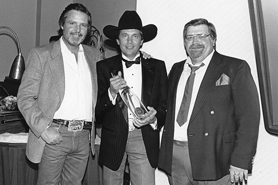 Pictured (L-R): Erv Woolsey, George Strait, Danny O'Brian. Photo courtesy of EB Media