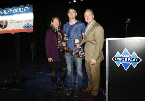 Pictured (L-R): Sarah Trahern, CMA Chief Executive Officer; CMA's first triple Triple Play Award recipient Ashley Gorley; and host Troy Tomlinson, President and CEO of Sony/ATV Music Publishing. Photo: Donn Jones / CMA