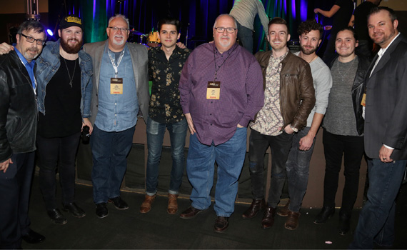 At new Arista Nashville band LANco's showcase at Nashvilles 3rd & Lindsley. Pictured (L-R): Consultant Joel Raab; LANcos Jared Hampton; WQYK/Tampa OM/PD Tee Gentry; LANcos Chandler Baldwin; WKXC/Augusta OM/PD Chris OKelley; LANcos Brandon Lancaster, Eric Steedly, and Tripp Howell; and WQYK/Tampa MD Kevin Ebel. Photo: Alan Poizner