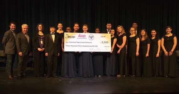 Pictured (L-R): ASCAP's Michael Martin, Logan's Roadhouse's Sam Borgese, Centennial High School's Allison Cowan, Jerrod Niemann (center) and members of the Centennial High School Orchestra. Photo: Ed Rode