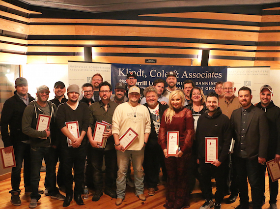 Songwriters and their #1 plaques 