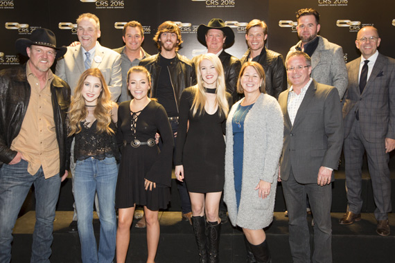 Pictured  (L-R): Trace Adkins; Maddie & Tae; Ashley Campbell; Sarah Trahern, CEO, CMA; Pete Fisher, Vice President/General Manager, Grand Ole Opry. (Back): Bill Mayne, Exec Director, CRB/CRS; Easton Corbin; Chris Janson; Tracy Lawrence; Chris Carmack;  David Nail; Charlie Morgan, President, CRB/CRS. Photo: Chris Hollo/Rachael Black