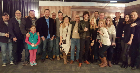 Pictured (L-R): Chris Palmer VP WAR, Kevin Herring SVP WMN, Michael Bryan PD WSIX and daughter Sophie, JR Shuman PD SIRIUS XM, Charlie Cook PD WKDF, Gator Harrison PD WUSY and wife, John Shomby PD NASH, Chris Janson, Kelly Janson, Chad Schultz WMN, Justin Cole Premiere and wife, Kimsey Kerr MD WSIX, Rod Phillips VP IHeart and wife, Tom Starr SE WAR