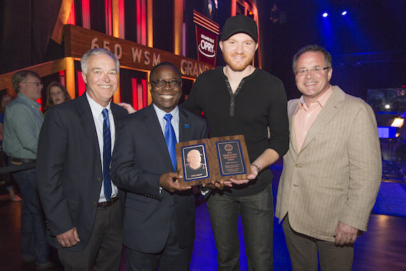 Top photo (L-R): Ken Paulson, MTSU Dean of the College of Media and Entertainment, Dr. Sidney McPhee, Eric, Pete Fisher. 