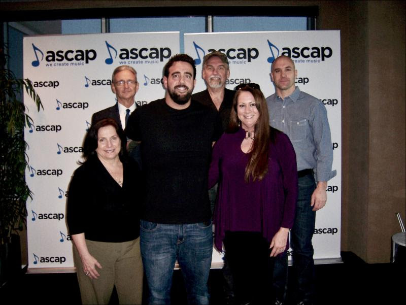 Pictured (back row, L-R):  Karl Braun, attorney; Joe Scaife, Partner, Little Extra Music; Robert Filhart, ASCAP. (front row, L-R): Denise Nichols, attorney; Rob Snyder; Lisa Ramsey-Perkins, Partner, Little Extra Music.