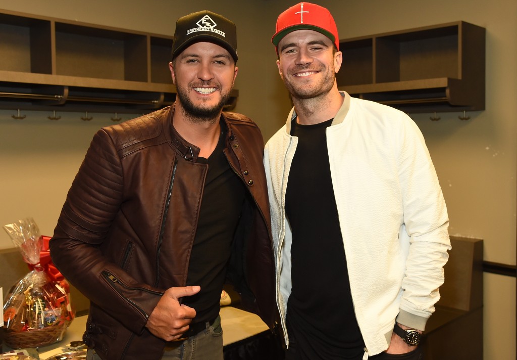 Singer-songwriters Luke Bryan (L) and Sam Hunt attend All for the Hall at the Bridgestone Arena on April 12, 2016 in Nashville, Tennessee. Photo: Rick Diamond/Getty Images 