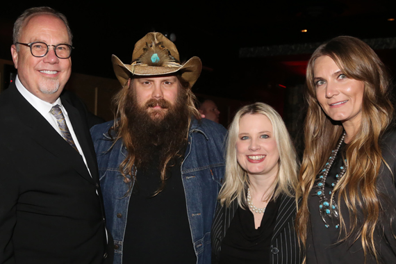 Pictured (L-R): UMG Nashville Chairman and CEO Mike Dungan, top award winner of the night Chris Stapleton, UMG Nashville President Cindy Mabe, Morgane Stapleton. 