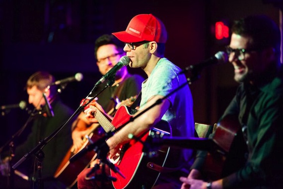 Pictured: Bobby Bones (red hat) leads the late round at 3rd & Lindsley with Ashley Gorley, Chris DeStephano and Lee Thomas Miller Photo Credit: Jason Delkou Photography