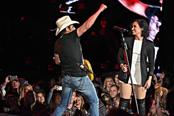 Pictured (L-R): Brad Paisley and Demi Lovato. Photo: Derek Cressman