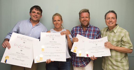 BMI's Leslie Roberts and Jody Williams present Rhett Akins and Wendell Mobley with Millionaire Awards at the San Carlos Institute during Key West Songwriters Festival on May 6, 2016. (Erika Goldring Photo)