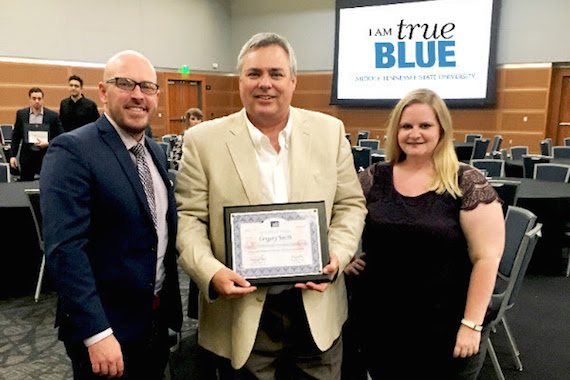 Pictured (L-R): Tim Gray, SOLID University Outreach Chair (Grayscale Entertainment Marketing); Gregory Smith, MTSU Student and Scholarship Recipient; Lisa Nolan, SOLID University Outreach Co-Chair (For the Record Entertainment)