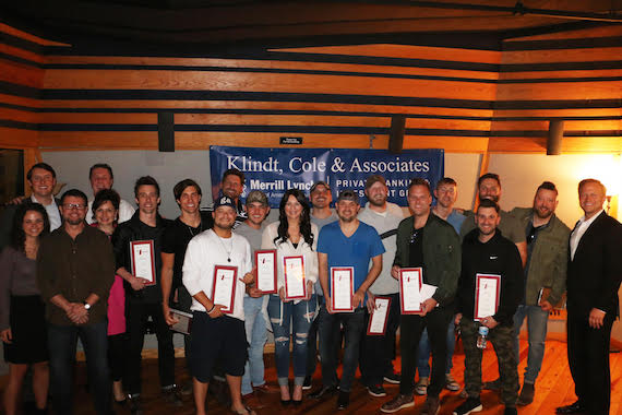 Songwriters with their No. 1 plaques. Photo: courtesy of NSAI