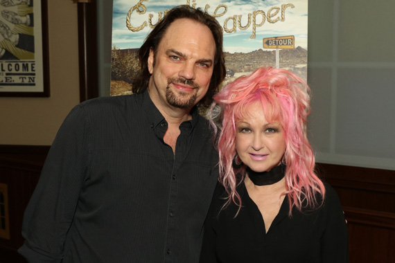 MusicRow Publisher Sherod Robertson visits with Lauper at a private industry reception following her Ryman show.