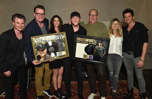 Pictured (L-R): Justin Luffman, VP Brand Management, WMN; Peter Strickland, EVP & GM, WMN; Kerri Edwards, Manager, KP Entertainment; Cole Swindell; John Esposito, President & CEO, WMN; Cris Lacy, VP A&R, WMN; Michael Carter, Producer 