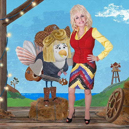 Dolly Parton poses with her character, Noreen, on Lily's Driftwood Bay. 