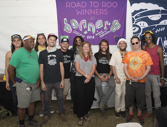 Pictured (L-R): ROARs Marco Martinez, sound technician EL Copeland, ROARs Dan Twiford, Troy Wiggins, Zach Fowler and Jeremyck Smith, BMIs Nina Carter, ROARs Austin Smith and Adam Quellhorst, sound technician Shaun Washburn and ROARs Justin Smith pose for a photo before their set as reigning champs of the BMI Road to Roo competition. Photo: Erika Goldring.) 