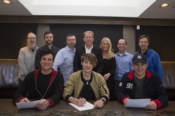 Pictured, Back Row (L-R): Malcolm Mimms, EVP/General Counsel, BMLG; Matthew Morgan, agent, CAA; Andrew Kautz, COO, BMLG; Manager John Hamlin, Allison Jones, SVP A&R, BMLG; Jordan Keller, attorney; Matthew Hargis, VP Promotion, BMLG. Front Row, (L-R): Scott Borchetta, President/CEO, BMLG; Ryan Follese, Jimmy Harnen, EVP, BMLG. Photo: Seth Hellman