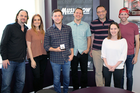 Pictured (L-R): Sherod Robertson, Molly Hannula, Scotty McCreery, Troy Stephenson, Craig Shelburne, Jessica Nicholson, Eric T. Parker