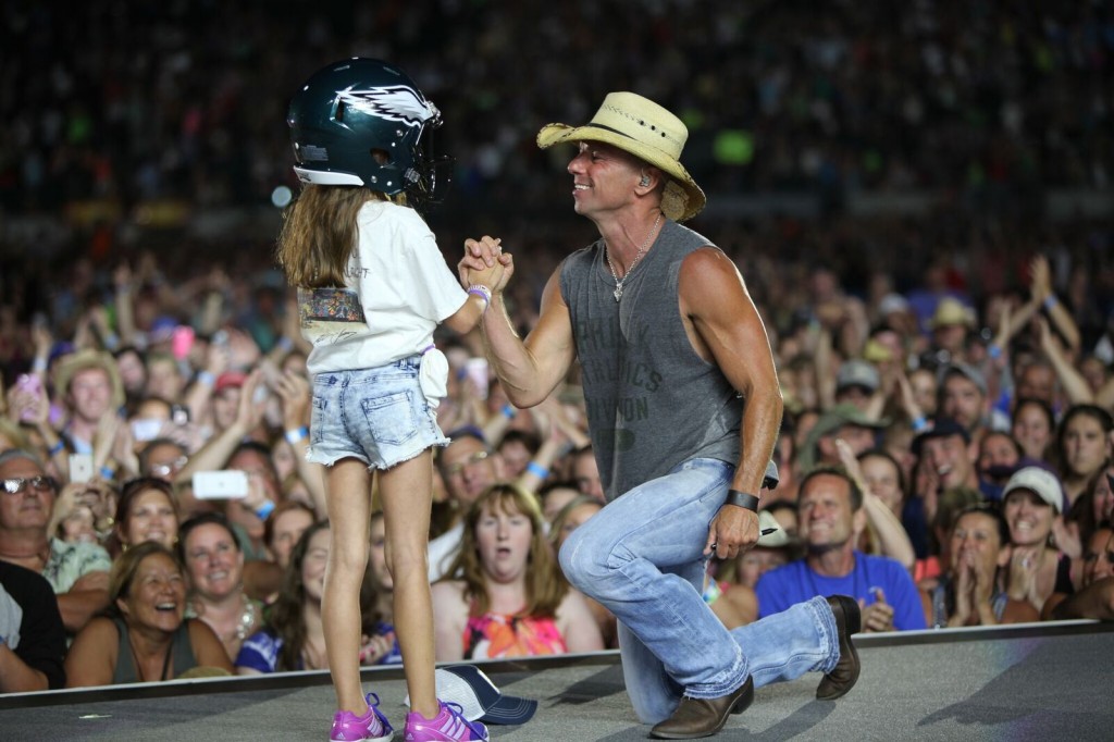 Kenny Chesney honors young fan with Philadelphia Eagles helmet Credit: Jill Trunnell