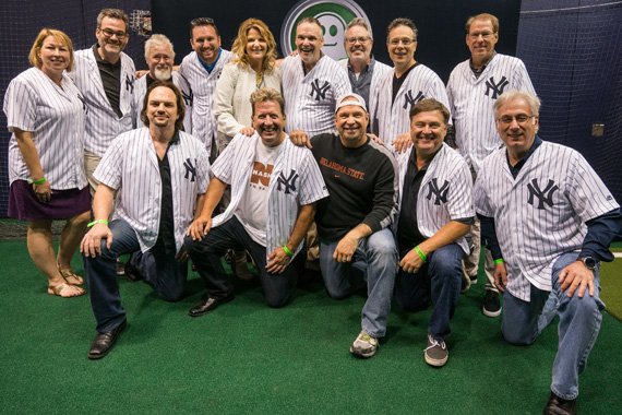 Nashville industry guests joined superstar Garth Brooks at the second night of his two night stand (7/8 and 7/9) at Yankee Stadium in New York City. The shows at Yankee Stadium marked the first time in nearly 20 years that Brooks has played New York City. The previous time was his historic 1997 performance in Central Park, which drew nearly one million spectators. Pictured: Top row L-R: Sarah Trahern, Steve Buchanan, Ray Waddell, JR Schumann, Trisha Yearwood, Bill Mayne, Blair Garner, Robert Deaton, John Hamlin. Bottom row L-R: Sherod Robertson, Shawn Parr, Garth Brooks, Lon Helton, Charlie Cook. Photo: Ben Krebs.