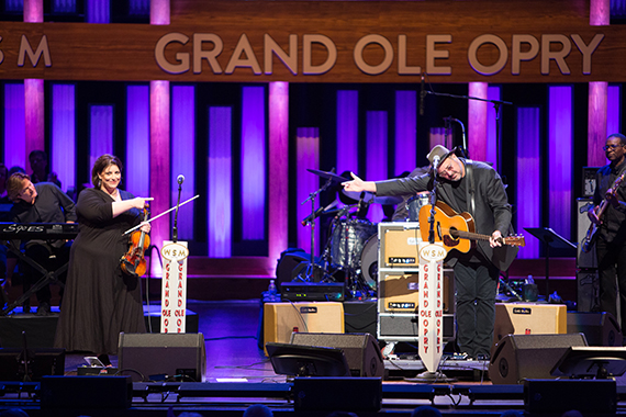 Vince Gill celebrates and pays mutual respect to friend Andrea Zonn who joined him onstage for one of his classic hits "Look At Us"