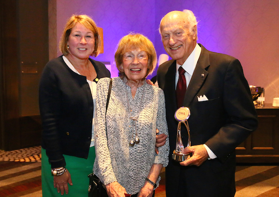 Pictured (L-R): CMA Chief Executive Officer Sarah Trahern and former CMA Executive Director Jo Walker-Meador congratulate Board member Bill Denny as the recipient of the inaugural J. William Denny Award. Denny began serving on the CMA Board during Walker-Meader's tenure. Photo: Kayla Schoen / CMA