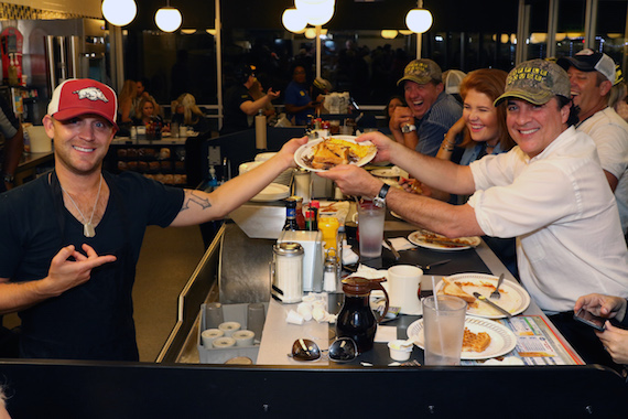 Hopping behind the grill, Moore served up late night meals for VIPs including BMLG President/CEO Scott Borchetta. Photo: Jeremy Westby 