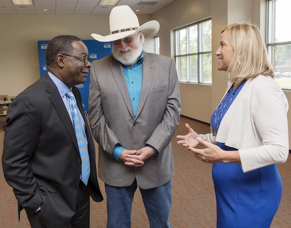 Nashville Mayor Megan Barry, right, visits with MTSU President Sidney A. McPhee, left, and country music legend Charlie Daniels before the Aug. 23 unveiling ceremony in the Miller Education Center. MTSU recognized Charlie and Hazel Daniels and The Journey Home Project for gifts totaling $120,000 for the Charlie and Hazel Daniels Veterans and Military Family Center, which is named in their honor. (MTSU photo by Andy Heidt)