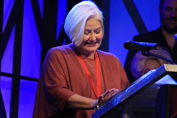 Alison Booth accepts her honor. Photo: Moments By Moser Photography