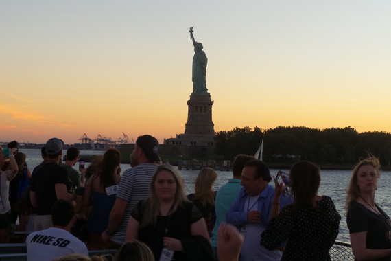 Guests take private ferry to the iconic Ellis Island.