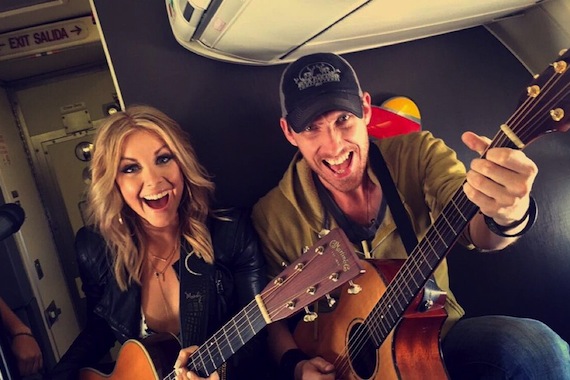 Lindsay Ell (left) performs a Live at 35 concert aboard Southwest Flight 1035 on her way back to Nashville for her Wednesday Night Opry performance. Photo: Grand Ole Opry 