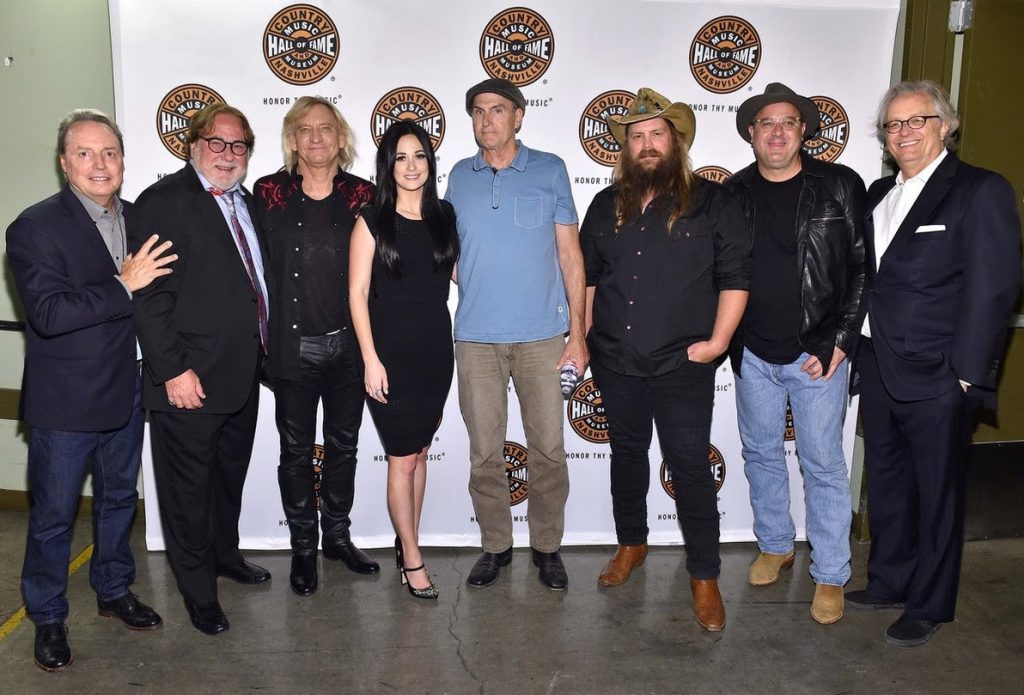 Pictured are (L-R): BMI's Jody Williams, CAA's Rod Essig, Joe Walsh, Kacey Musgraves, James Taylor, Chris Stapleton, Vince Gill and Country Music Hall of Fame and Museum CEO Kyle Young. Photo by Mike Windle, Getty Images for the Country Music Hall of Fame and Museum.