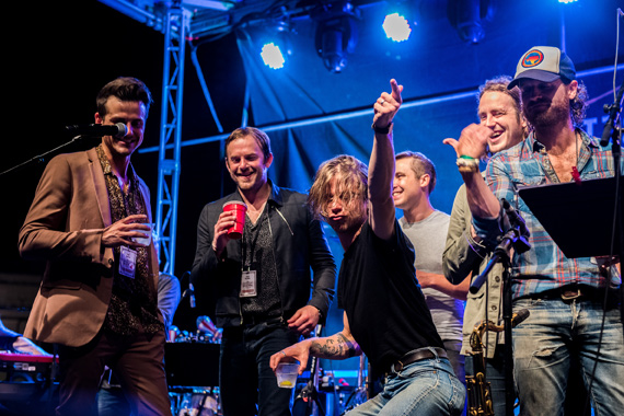 Harvest Night finale. Pictured (L-R): Kings of Leon's Jared Followill, Caleb Followill; Cage The Elephant's Matt Shultz; alongside Chris Coleman. Photo: Charles Reagan Hackleman