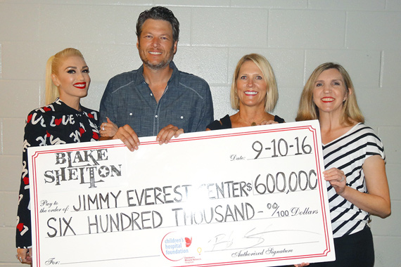 Pictured (L-R): Gwen Stefani, Blake Shelton, Evelyn Bollenbach, Dr. Ashely Baker of the Jimmy Everest Center